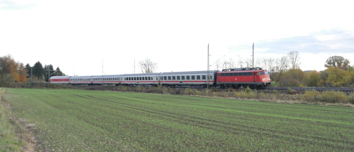 115 346-9 mit Rückführung  reparierter IC Wagen; der letzte Wagen, ein Schlafwagen in Neu-Ulm Pfuhl am 03.11.2009.