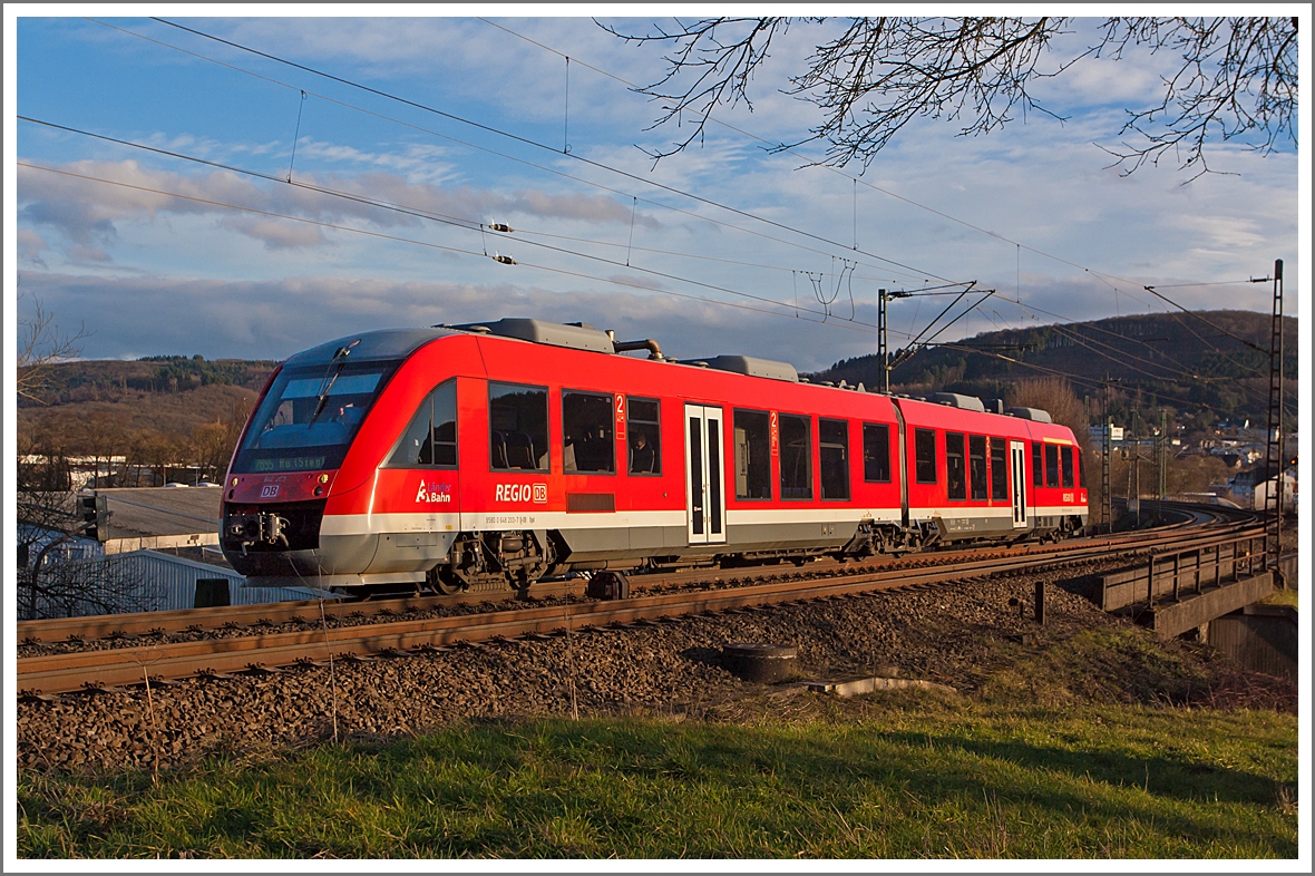 Der Alstom Coradia LINT 41 (Dieseltriebwagen) 648 203 / 703 der DreiLnderBahn als RB 95  Sieg-Dill-Bahn  (Dillenburg-Siegen-Betzdorf/Sieg-Au/Sieg) fhrt am11.02.2014 von Haiger weiter in Richtung Siegen.

Hier fhrt er auf der KBS 445 (Dillstrecke), ab Siegen geht es dann weiter auf der KBS 460 (Siegstrecke)