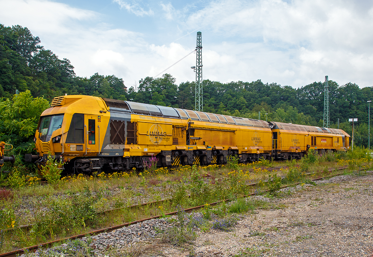 Der LINMAG Schienenfrszug MG 31 (Rail milling train MG31), Schweres Nebenfahrzeug Nr. D-DB 99 80 9427 009-2, der DB Bahnbau Gruppe GmbH steht am 23.06.2018 in Betzdorf/Sieg.

Der Schienenfrszug MG 31 wurde 2012 von LINSINGER Austria Maschinenbau Ges. m.b.H. in Steyrermhl (sterreich) entwickelt und gebaut. Auf der InnoTrans 2012 wurde er erstmals der ffentlichkeit vorgestellt. Die Schienenfrsmaschine MG 31 ist bis heute weltweit die leistungsstrkste Schienenfrsmaschine. Defekte knnen  bis zu 3,6 mm tiefe in nur einer berfahrt beseitigt werden, das ist einzigartig.
