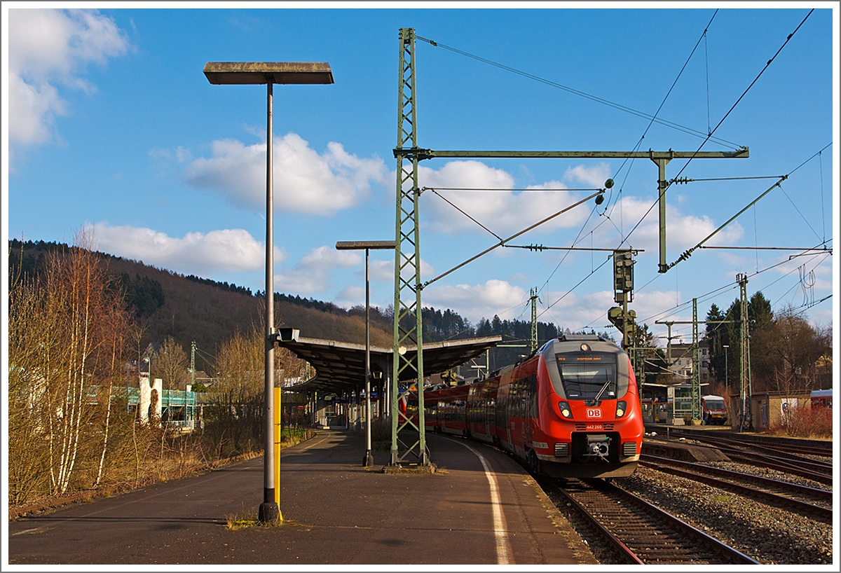 Der  RE 9 (rsx - Rhein-Sieg-Express) Siegen - Köln - Aachen  am 02.03.2013 beim Halt im Bahnhof Betzdorf/Sieg am Gleis 106, bestehend aus zwei gekuppelte vierteilige Talent 2 dem 442 260 / 760 und 442 761 / 261.