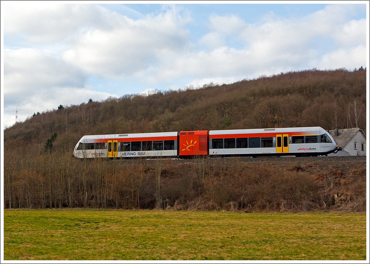 Ein Stadler GTW 2/6 der Hellertalbahn fährt am 23.02.2014 als RB 96  Hellertalbahn  die Verbindung Neunkirchen - Herdorf - Betzdorf/Sieg, hier kurz vor dem Hp Herdorf-Sassenroth.