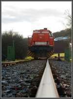 Die WLE 51  Kreis Warendorf  (Westfälische Landes-Eisenbahn) eine MaK G 1206 steht am 11.02.2014 am einem Werksanschluß in Burbach-Holzhausen.