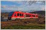 Der Alstom Coradia LINT 41 (Dieseltriebwagen) 648 203 / 703 der DreiLnderBahn als RB 95  Sieg-Dill-Bahn  (Dillenburg-Siegen-Betzdorf/Sieg-Au/Sieg) fhrt am11.02.2014 von Haiger weiter in Richtung
