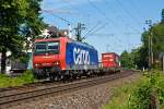   Die Re 482 022-1 der SBB Cargo fhrt am 06.06.2014 mit einem Hupac-Zug durch Knigswinter in Richtung Sden.