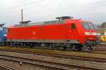 br-145-traxx-f140-ac/394563/die-145-039-4-91-80-6145 
Die 145 039-4 (91 80 6145 039-4 D-DB)  der DB Schenker Rail Deutschland AG steht am 25.12.2014 in Kreuztal im Abstellbereich. 

Die  TRAXX F140 AC  wurde 1999 bei ABB Daimler-Benz Transportation GmbH (Adtranz) in Kassel unter der Fabriknummer 33357 gebaut. Sie besitzt ein Regio-Paket und ist so auch für Personenzüge gut einsetzbar.