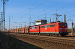  Zwei 151er in Doppeltracktion, die 151 087-4 und 151 016-3 der DB Schenker Rail Deutschland AG ziehen einen langen Schüttgutwagen am 09.03.2014 bei Koblenz-Lützel in Richtung Süden.