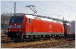 Die 185 070-0 der DB Schenker Rail Deutschland AG steht am 08.03.2014 in Kreuztal im Abstellbereich und macht sich mit der (verdeckten) 145 084-0 zur Fahrt zum Rangierbahnhof bereit, um einen