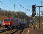 Die 185 348-0 (eine Bombardier TRAXX F140 AC 2) der DB Schenker Rail zieht am 02.03.2013 einen Kesselwagenzug durch den Bahnhof Betzdorf Sieg in Richtung Siegen.