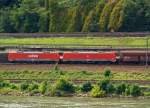 189 067-2 und 189 040-9 mit Erzzug fahren am 04.07.2012  auf der linken Rheinseite, gegenber von Unkel (bei Rheinkilometer 636), aufwrts in Richtung Koblenz.Auffllig ist hier die