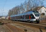 ET 23 001(3-teiliger Stadler Flirt) der Abellio Rail NRW fhrt am 11.02.2012 kurz vor dem Bf Kreuztal.