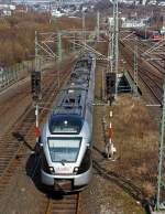 ET 23 001(3-teiliger Stadler Flirt) der Abellio Rail NRW kommt am 24.03.2012 von der Ruhr an die Sieg, hier kurz vor der Entstation Hbf Siegen.