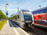   Zwei gekuppelte vierteilige Siemens Desiro HC (462 016 und 462 021) des RRX Rhein-Ruhr-Express (betrieben vom der National Express) fahren am 01.06.2019, als RE 5 „Rhein-Express“ nach