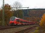 442 256 und 442 254 (Zwei gekuppelte 4-teilige Talent 2) fhrt am 11.11.2012 als RE 9 (rsx - Rhein-Sieg-Express) Siegen - Kln - Aachen in Richtung Kln, hier bei Betzdorf-Bruche.