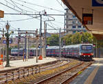 trenitalia-2/783774/im-sandwich-zweier-e464-gefuehrt-von Im Sandwich zweier E.464 (gefhrt von der E.464.397) erreicht der Trenitalia InterCity Notte ICN 1962, von Syrakus (Siracusa) nach Milano Centrale, pnktlich den Bahnhof Catania Centrale. Wir fahren bis La Spezia mit ihm.