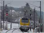 Mit viel Bügelfeuer drückt die 3004 ihre Dostos aus dem Bahnhof von Wilwerwiltz. Mit diesem Bild begann am 21.12.2009 unsere schneereiche Reise nach Chur. (Jeanny) 