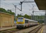 Serie 3000/283401/-einfahrt-des-ir-115-liers . Einfahrt des IR 115 Liers - Luxembourg in den Bahnhof von Ettelbrck. Der Zug verkehrt auf der Voie 2, daneben befindet sich die Voie 1, beide Gleise bilden die Hauptstrecke Ligne 10 Luxembourg - Troisvierges. 

Hinten sieht man die Weiche, welche zur Voie 3a fhrt, aber es besteht keine Mglichkeit von der Hauptstrecke zur Stichstrecke nach Diekirch zu gelangen.


05.07.2013 (Hans)
