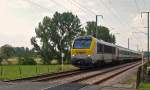 . Am Bahnbergang in Rollingen/Mersch konnte ich die 3006 mit dem IC 116 Liers - Luxembourg am Haken ablichten. 21.08.2015 (Hans)
