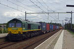 class-66-emd-jt42cwr/771063/railtraxx-266-031-doennert-mit-ein Railtraxx 266 031 dnnert mit ein Contaibnerzug durch Tilburg-Reeshof am 16 Augustus 2019. 