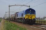 class-66-emd-jt42cwr/811039/railtraxx-266-009-passiert-am-15 RailTraxx 266 009 passiert am 15 April 2023 Hulten mit ein Kesselwagenzug.