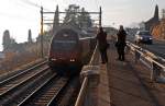 RE 460 Ja, auf dem Weg ins Wallis ist die Re 460  006-0 ''Lavaux'' mit ihrem Zug am 25.02.2012 und kam auch bei mir vorbei :-) (bei St. Saphorin)    �brigens: Diese 460er hat seit 1992, in 20 Betriebsjahren �ber 5 Millionen km gefahren, was neben dem Eingang zum F�hrerstand auch vermerkt ist.