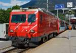 Die MGB HGe 4/4 II - 3   Dom  (ex BVZ 3   Dom ) steht am 28.05.2012 mit Glacier Express im Bahnhof (-vorplatz) Brig. Der Taufname  Dom  bezieht sich auf den in den Walliser Alpen liegenden Berg Dom (4.545 m . M.). Die HGe 4/4 II ist eine schmalspurige gemischte Zahnrad- und Adhsions-Lokomotive.