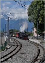 Die beide Dampfloks G 2x 2/2 105 und HG 3/4 N° 3 erreichen mit ihrem Extrazug von Vevey nach Chaulin den Bahnhof von St-Légier Gare. 

6. Juni 2022