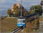 Der MOB ABDe 8/8 4004  Fribourg  im Regionalzugeinsatz als 2331 von Fontanivent und Montreux kurz nach Le Châtelard VD. 
23. Okt. 2015