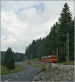 Bei typischem Jurawetter erreicht ein von la Cure kommender NStCM Regionalzug in Kürze La Giverine. 
28. Aug. 2013 