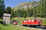 albulabahn-unesco-weltkulturerbe/799949/rhb-ge-44-i-nr601-und RhB Ge 4/4 I Nr.601 und Ge 4/4 III Nr.646 aus dem Albula-Tunnel kommend in Spinas im Bevertal am 19.08.2009.
