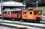 berninabahn-unesco-weltkulturerbe/772010/rhb-bde-44-nr38-und-xm RhB BDe 4/4 Nr.38 und Xm 2/2 Nr.9916 in Poschiavo im August 1990.