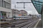 Metro Lausanne/835893/zwei-tl-tsol-be-46-be Zwei TL TSOL Be 4/6 (Be 558) erreichen von Lausanne Flon kommend sein Ziel Renens VD. 

14. Dezember 2023