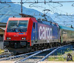 Als Lokportrait……  Die SBB Cargo Re 484 021  Gotthardo  (91 85 4 484 021-1 CH-SBBC / 91 83 2 484 021-7 I-SBBC) kommt am 22.06.2016 mit einem Ralpin-Zug (Rola-Zug) im Bahnhof Domodossola