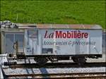 Der MOB Werbe-Güterwagen Gk 514 war am 25.05.2012 in Gstaad abgestellt und konnte aus dem fahrenden Goldenpass Classic fotografiert werden. (Hans) 