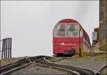 - Nebel gab es auch am Brienzer Rothorn - Der letzte Zug verlsst am 29.09.2013 die Station Rothorn Kulm und verschwindet im Nichts.