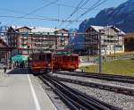 Vor der Kulisse des Hotel Bellevue des Alpes: Triebzug (2 gekuppelte BDhe 4/8) der Jungfraubahn vorne Triebwagen Nr.