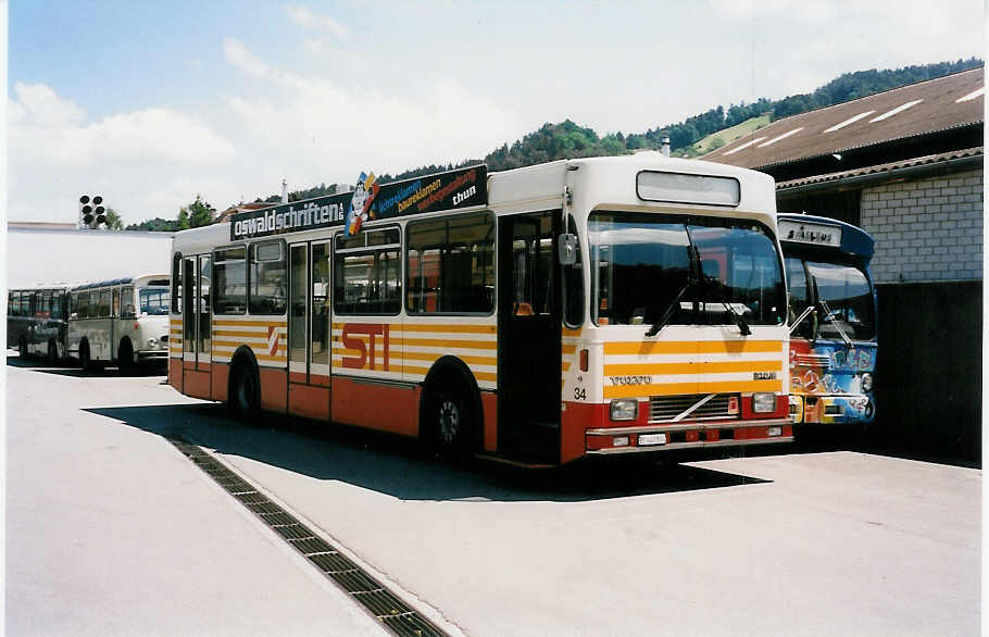 (031'930) - STI Thun - Nr. 34/BE 443'834 - Volvo/R&J (ex SAT Thun Nr. 34) am 9. Juni 1999 in Thun, Garage