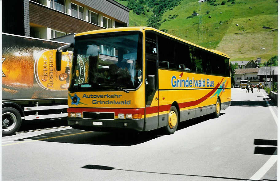 (048'718) - AVG Grindelwald - Nr. 12/BE 171'453 - MAN am 23. Juli 2001 beim Bahnhof Andermatt