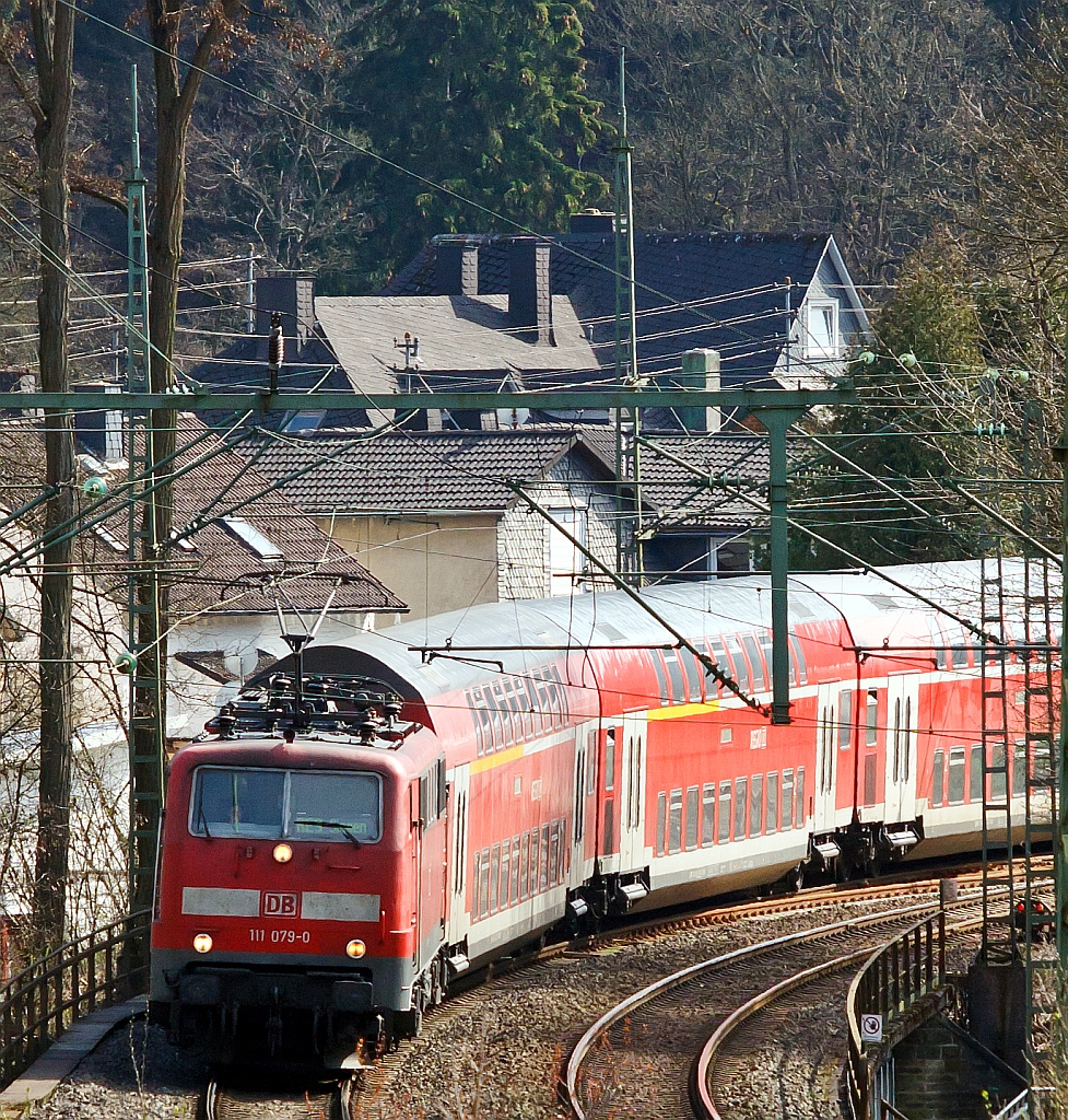 111 079-0 mit dem RE 9 (Rhein-Sieg-Express) Siegen-Kln-Aachen, am Schlu ist Schublok 111 080-8, hier am 01.04.2012 kurz vor der Einfahrt in den Bf. Kirchen/Sieg.