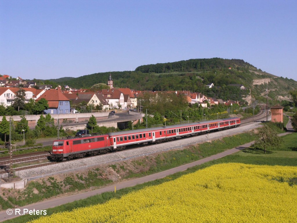 111 203 verl�sst Retzbach-Zellingen mit einer RB W�rzburg. 10.05.08