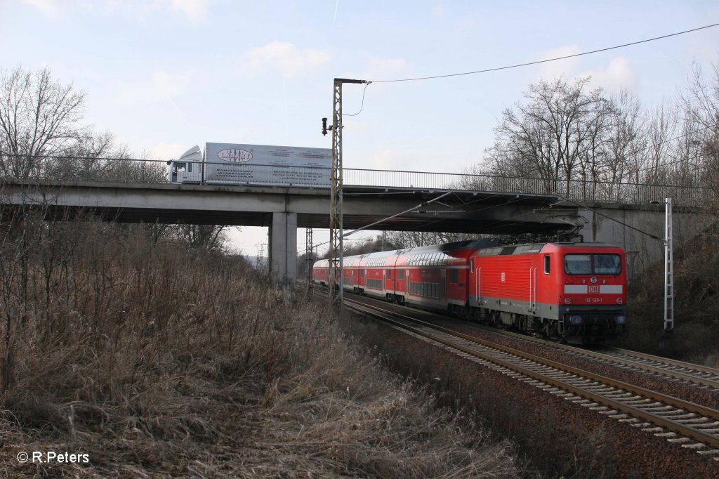 112 120-1 schiebt den RE1 RE18178 Eisenh�ttenstadt - Berlin Charlottenburg bei Frankfurt/Oder Nuhnen. 22.02.12
