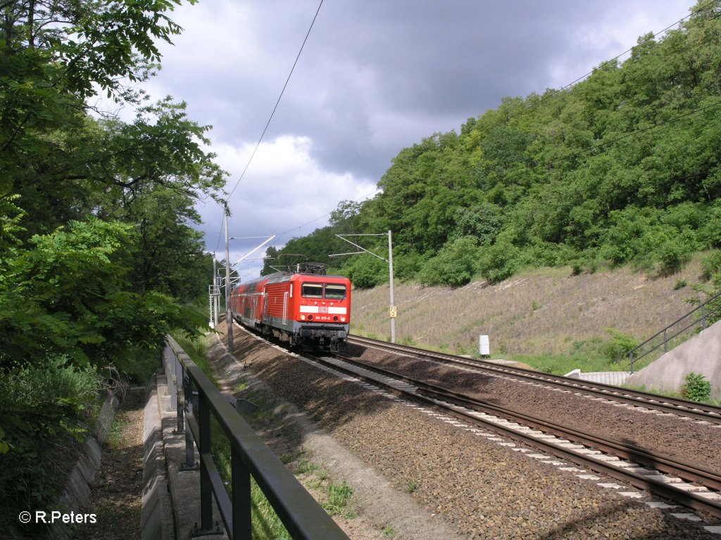 114 013-6 zieht bei Frankfurt/Oder Rosengarten den RE38007 Eisenh�ttenstadt. 05.06.09
