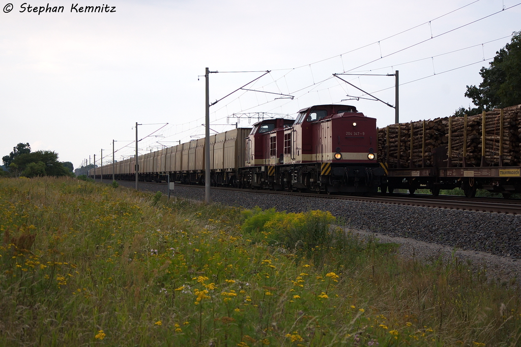 204 347-9 (202 347-1) & 204 354-5 (202 354-7) MTEG - Muldental Eisenbahnverkehrsgesellschaft mbH mit einem leeren Hackschnitzelzug in Vietznitz und fuhren in Richtung Nauen weiter. Am Zugende hing die 145 023-6 (kalt). Netten Gru� an den Tf! 10.08.2013