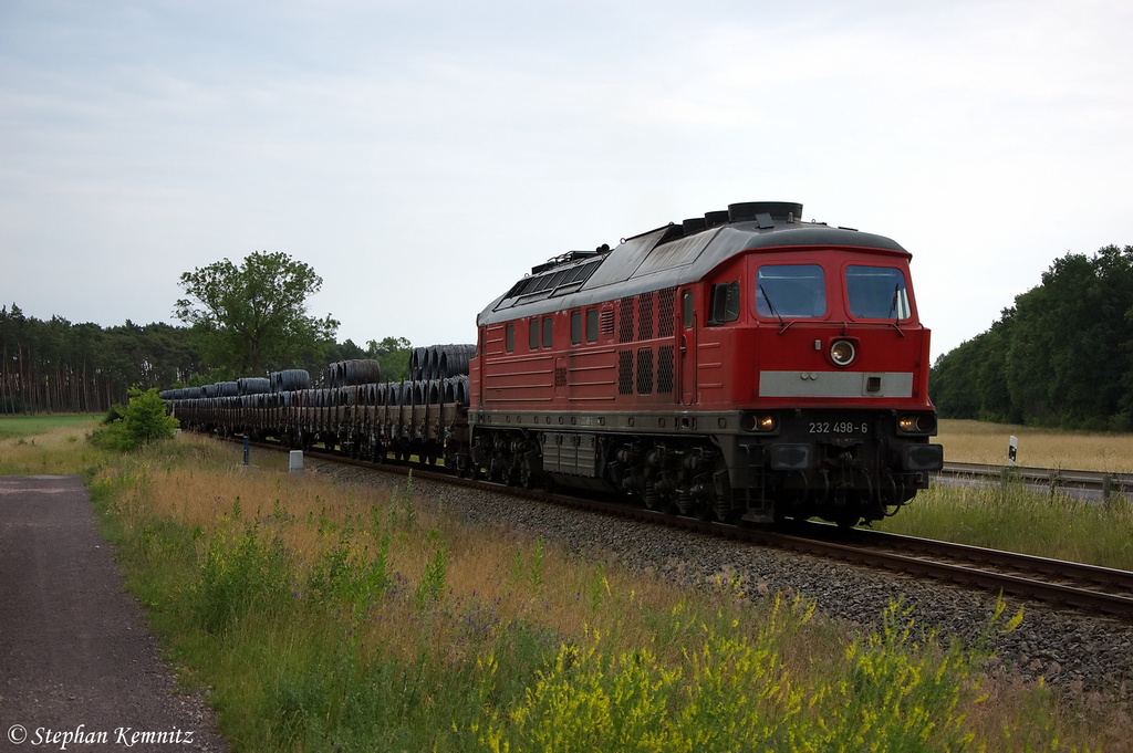 232 498-6 DB Schenker Rail Deutschland AG mit einem Drahtrollenzug aus Brandenburg Altstadt bei M�gelin und fuhr in Richtung Rathenow weiter. 19.06.2012