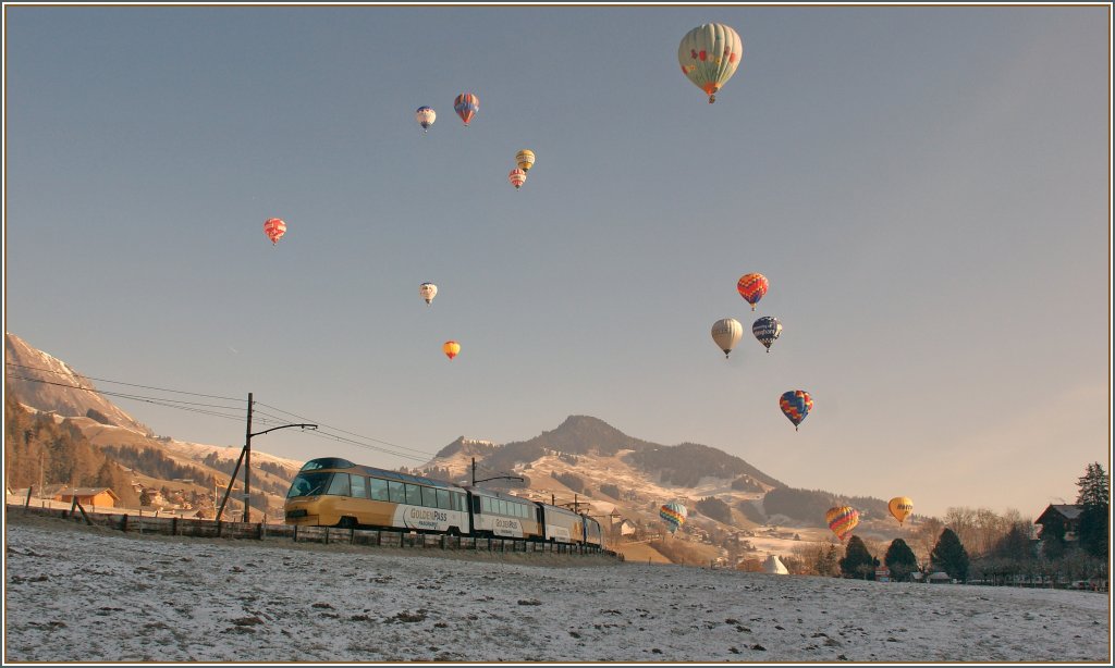 Der Golden Pass Panormamic Express whrend des Ballonfestivals bei Chteau d'Oex. 
23. Jan 2011