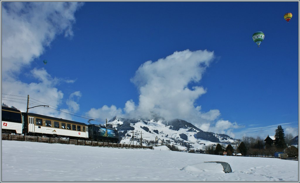 Kurz vor dem Eintreffen des Zuges in Ch�teau d'Oex waren leider fast alle Ballone aus dem Bild geflogen...
(28.0.1.2013)