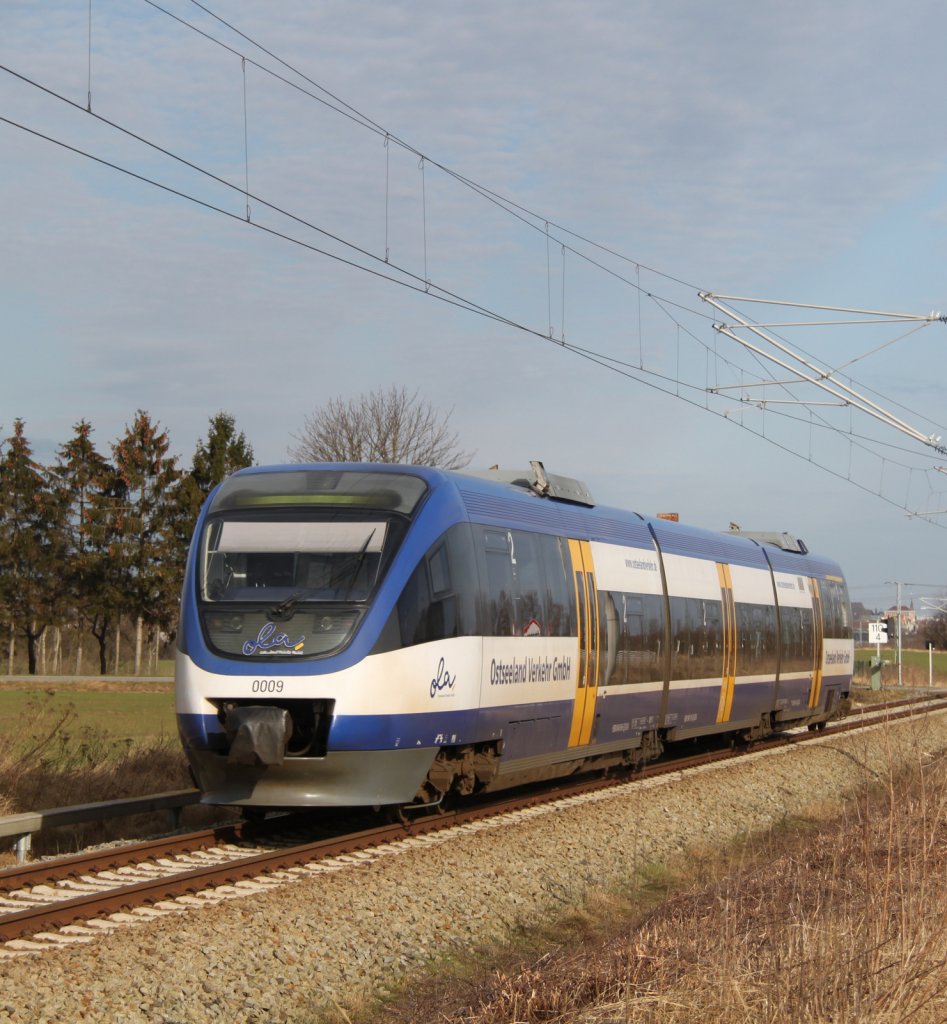 OLA-VT 0009 als OLA79758 von Gstrow nach Rostock Hbf kurz vor der Einfahrt im Rostocker Hbf.04.03.2012