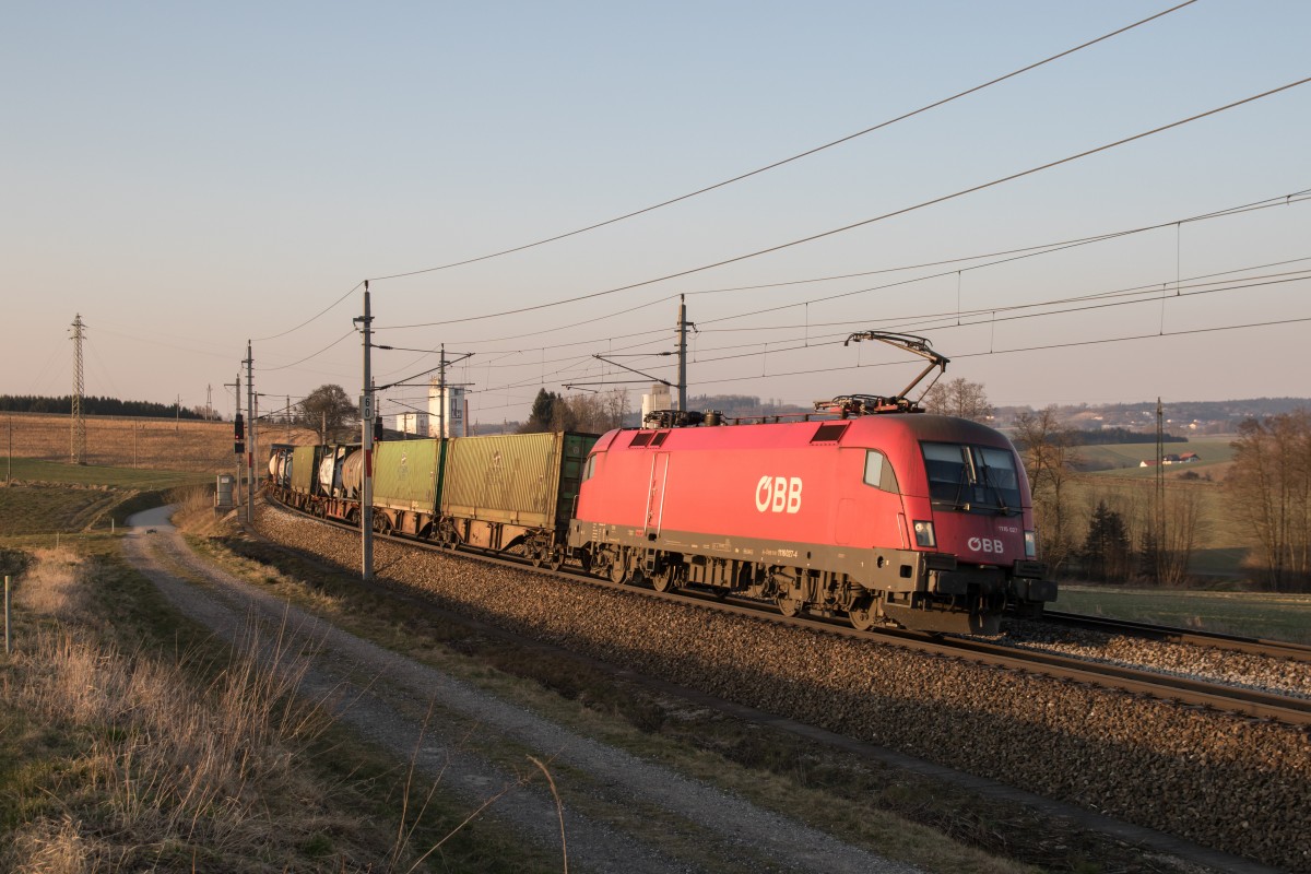 1116 027-2 ist am 18. Mrz 2015 bei Haiding in Richtung Wels unterwegs.