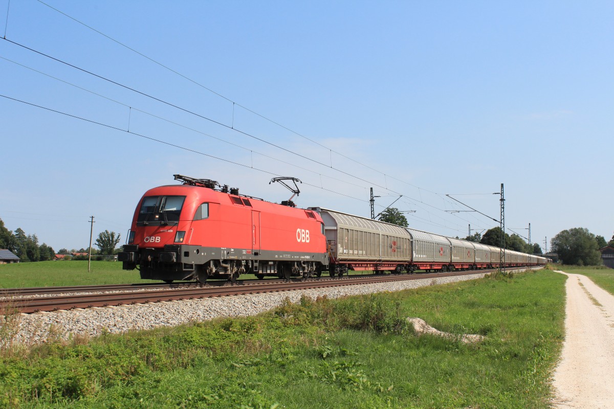 1116 028-2 am 31. August 2013 aus Salzburg kommend bei bersee am Chiemsee.