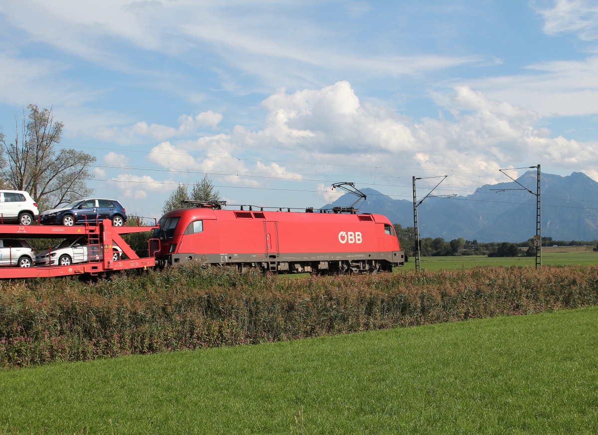 1116 078-7 war mit einem Autozug am 11.09.2015 bei Weisham in Richtung Salzburg unterwegs.