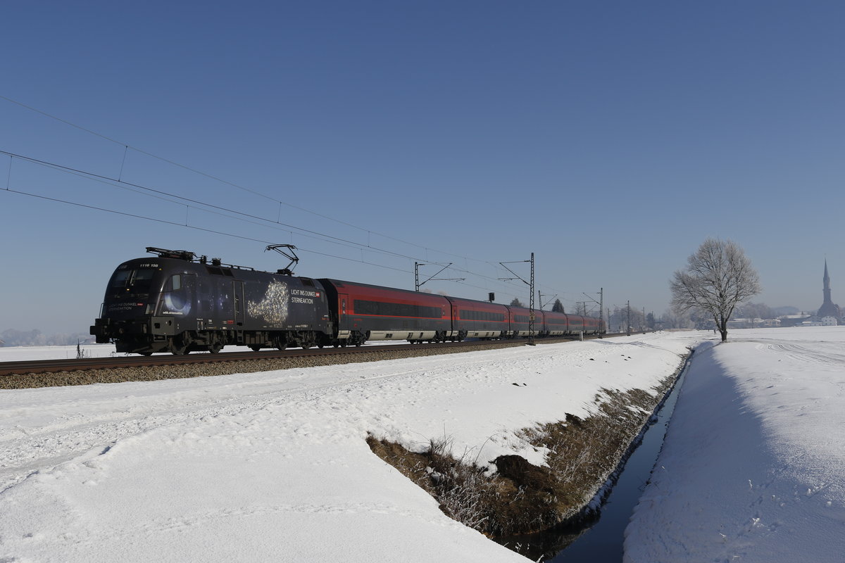 1116 158-7  Licht ins Dunkel  mit einem Railjet aus Salzburg kommend am 29. Januar 2017 bei bersee am Chiemsee.